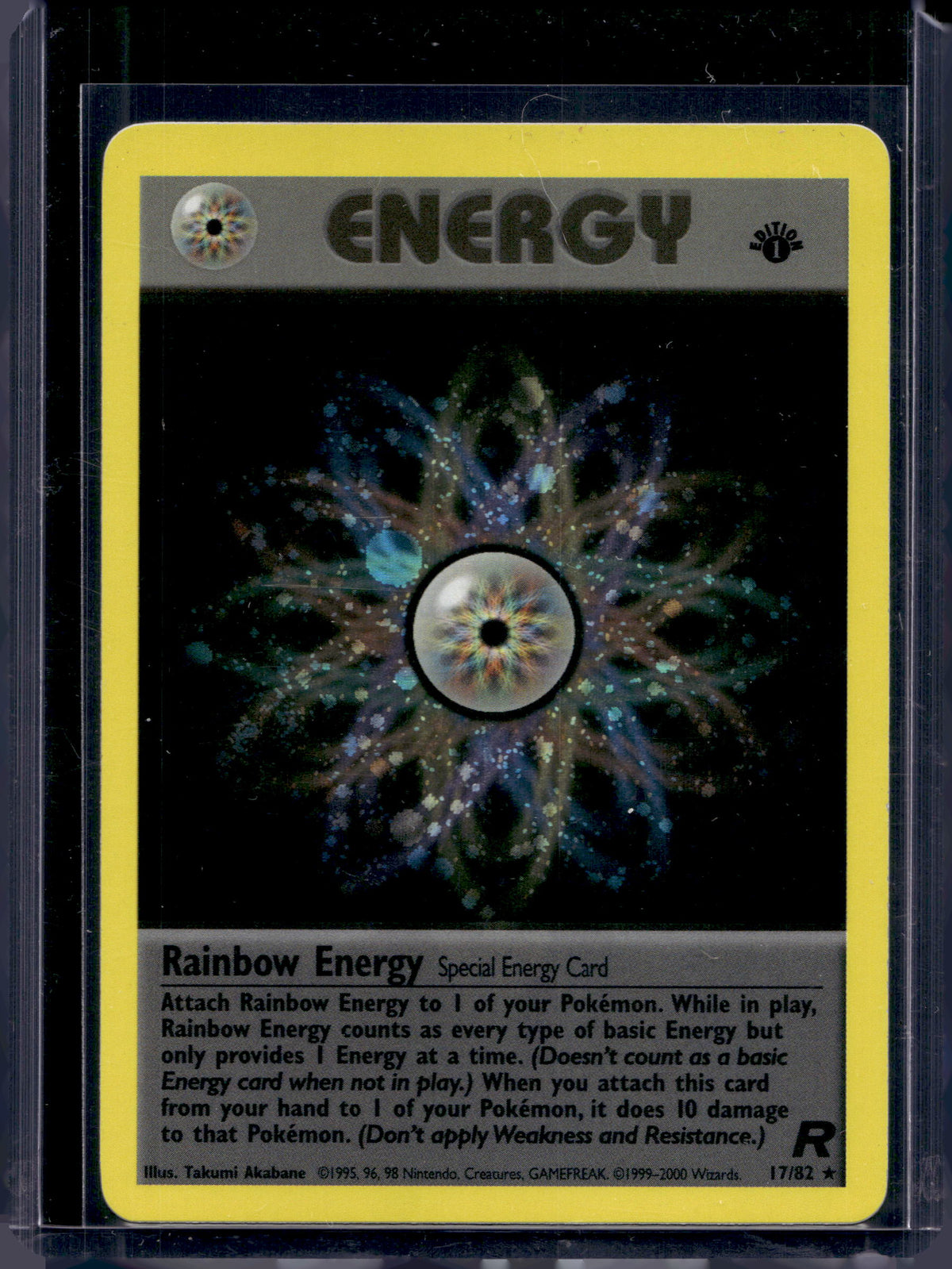 Rainbow Energy (Team Rocket's - 1 St Edition Holo) 17/82 Raw